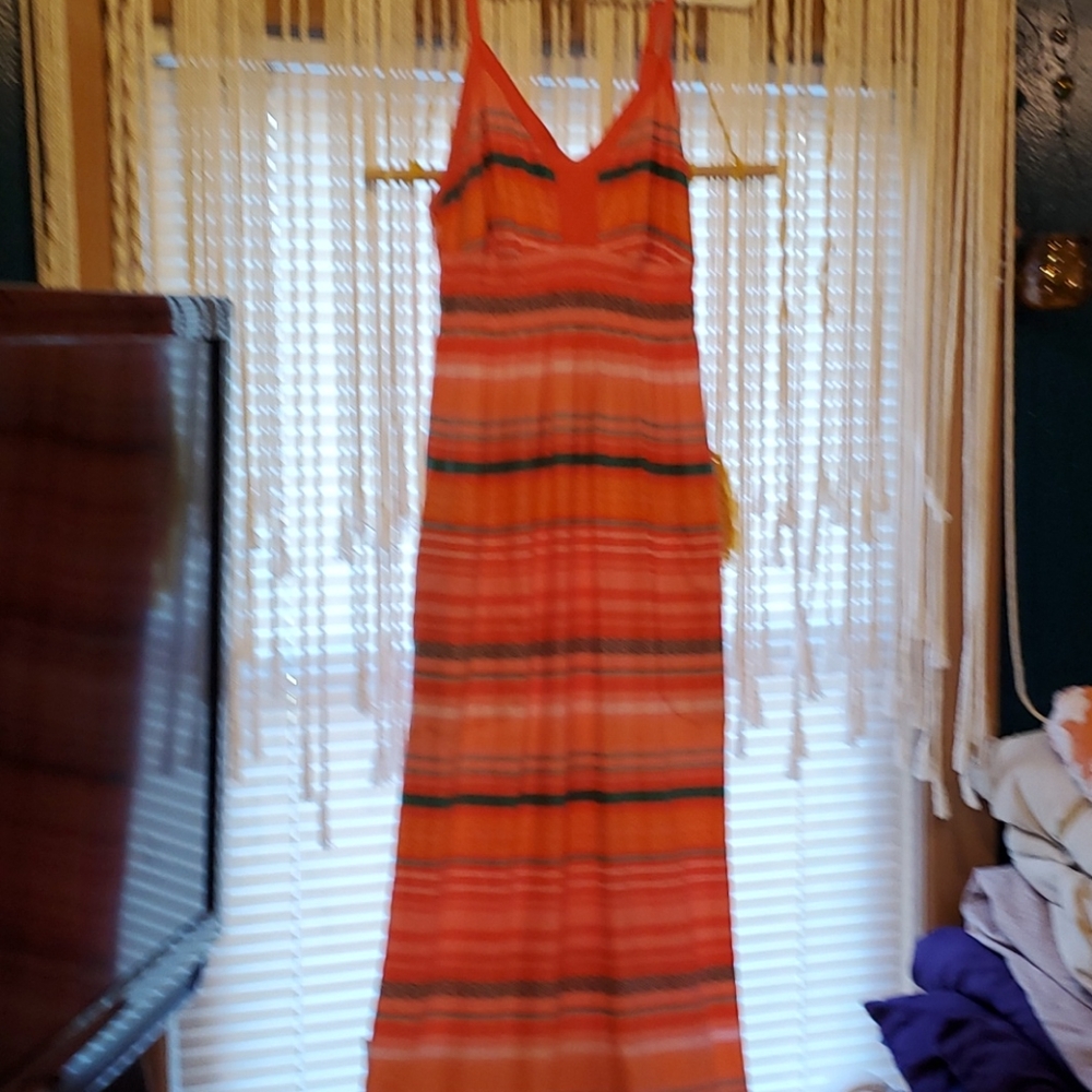 Gorgeous dress. Oranges, pinks, greens!